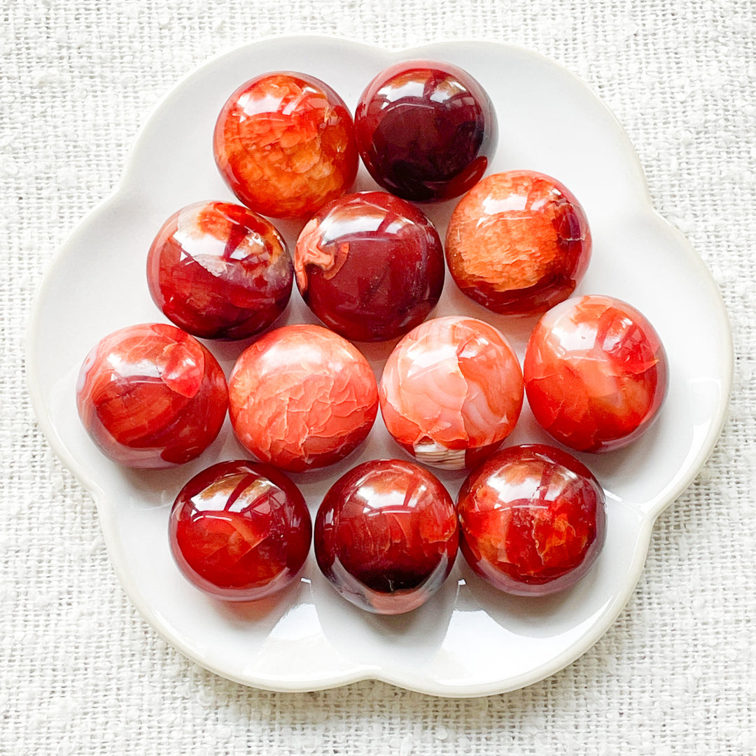 carneool rode knuffelsteen handsteen palmsteen trommelsteen