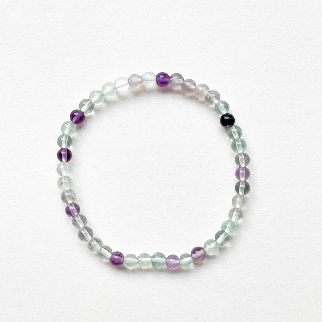 fluoriet regenboog kogelarmband 4mm edelsteen