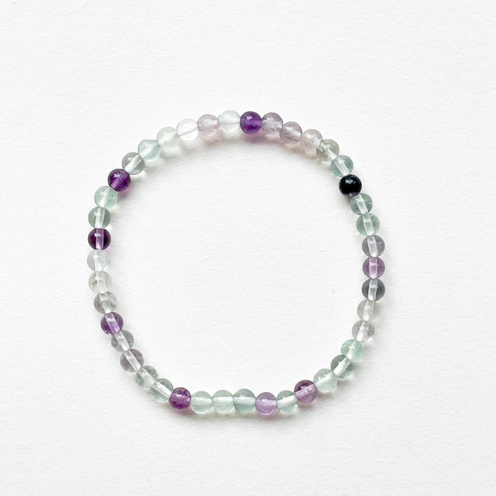 fluoriet regenboog kogelarmband 4mm edelsteen