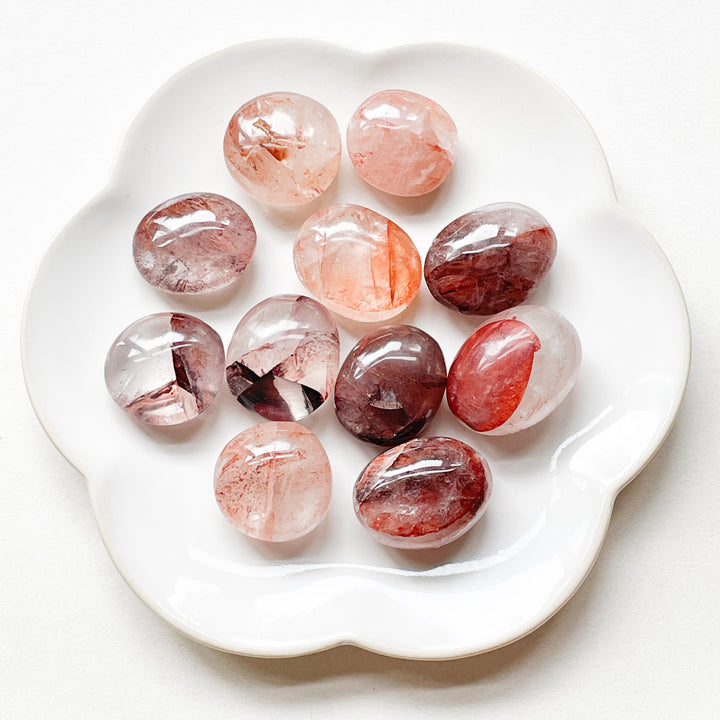 red healer hematoïde bergkristal zaksteen knuffelsteen trommelsteen edelstenen