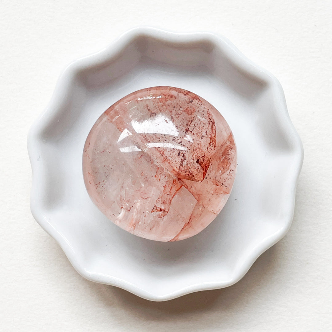 red healer hematoïde bergkristal zaksteen knuffelsteen trommelsteen edelstenen